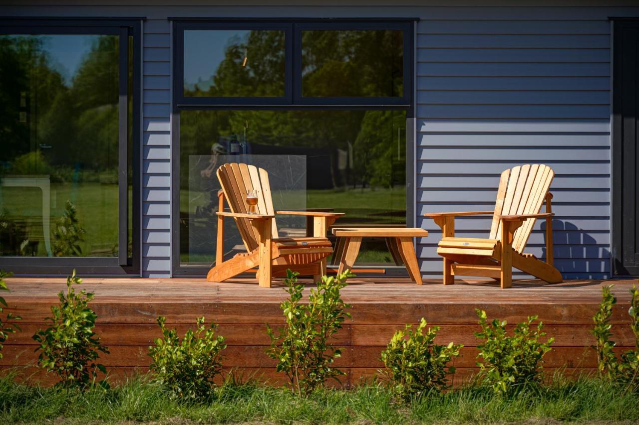 Parehua Resort Мартінборо Екстер'єр фото A deck with A-frame chairs